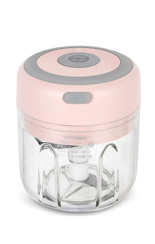 Pink and gray kitchen tool with clear container on a white background